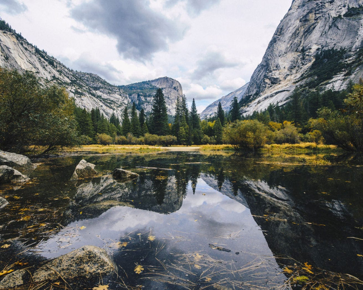 National forest lake with mountains and trees