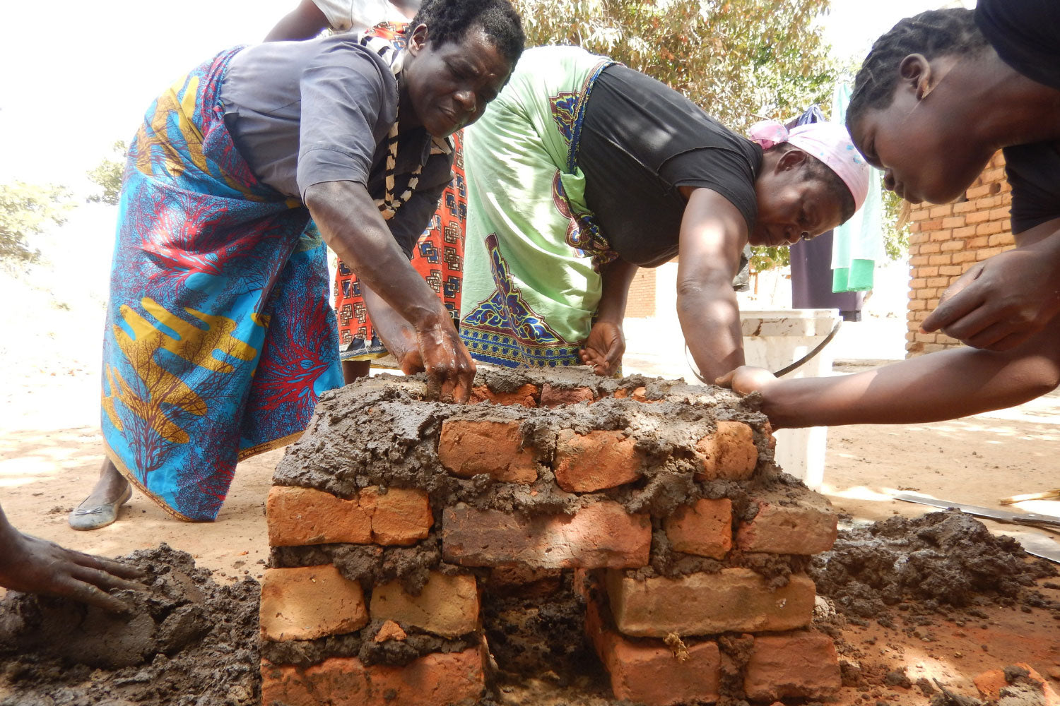 Women building in Africa